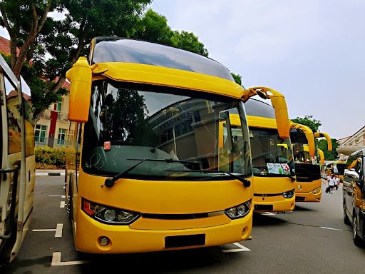 School bus Singapore fleet providing safe and reliable student transportation services
