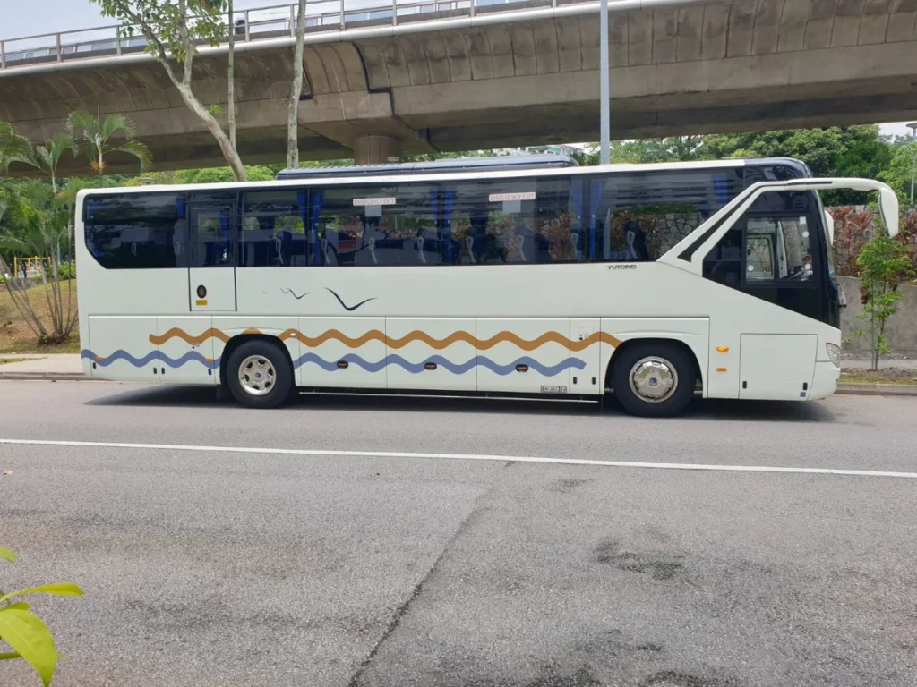 Hotel bus charter service in Singapore with private coach bus for airport transfers and group transportation
